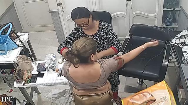 Hot Rich Bhabi Changing parlour Captured In CCTV
